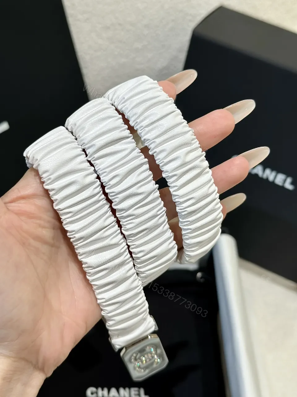 View 4 of Lux White Strap Belt-Style Watch: Pavé Logo Bezel