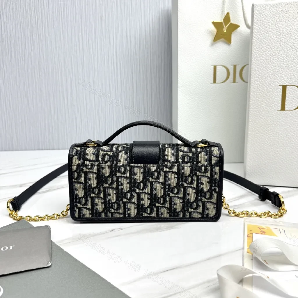 View 3 of Signature Crossbody: Lux Canvas, Gold Hardware, Compact Night-Ready