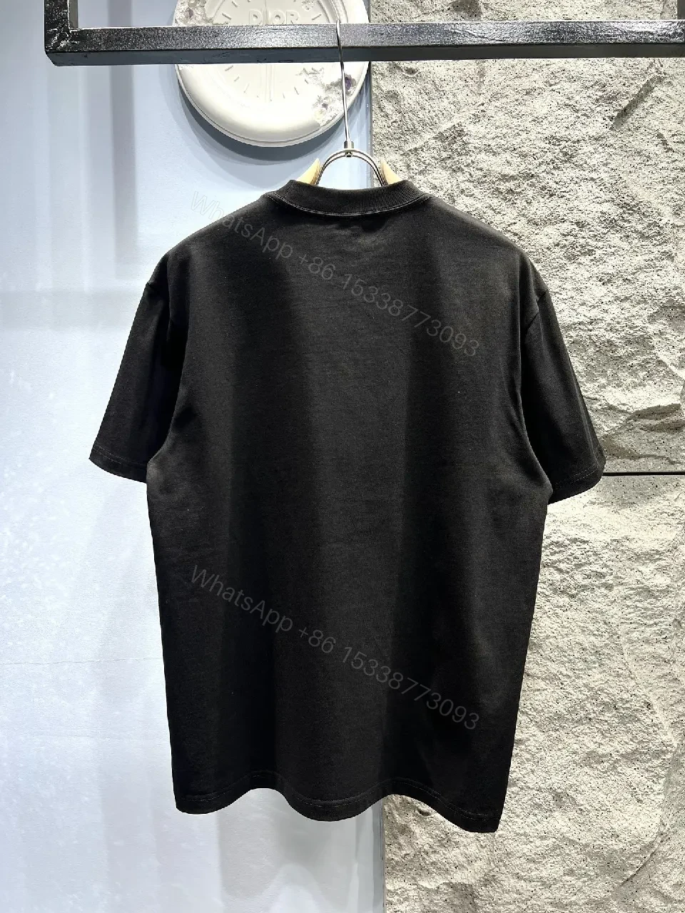 View 2 of Bold Black Tee with Red Fendi Logo Film-Glow