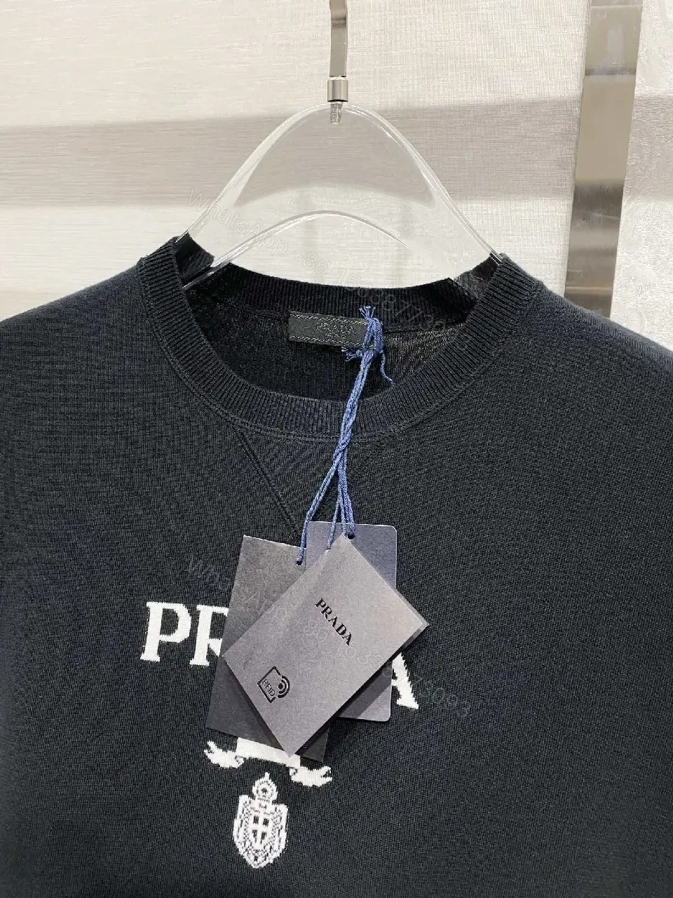 View 10 of Minimalist Cotton Tee with Crest – Elevated Everyday Essential