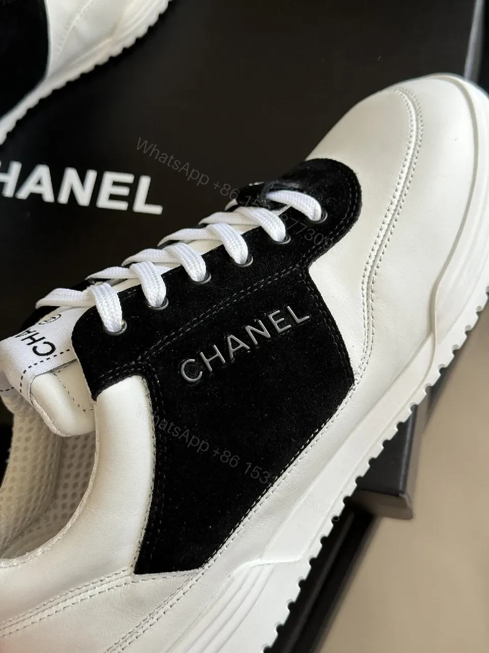 View 2 of Monochrome Leather Sneaker: Refined Comfort & Contrast