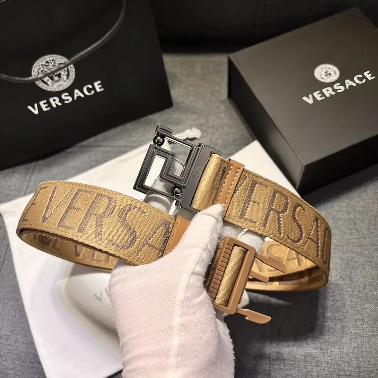 View 2 of Textured Logo Tape Belt: Premium Camel Strap with Modern Buckle