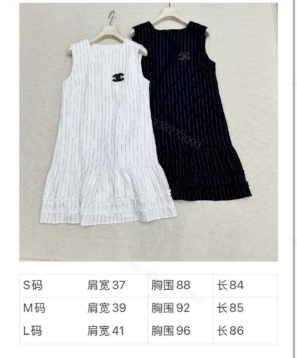 View 3 of Navy Pinstripe Cotton A-Line Dress with Chanel Logo Key Feature