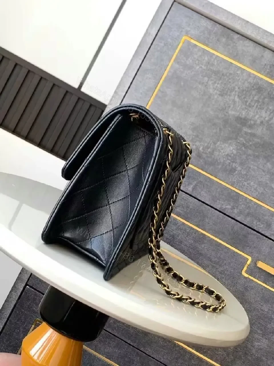 View 2 of Quilted Leather Flap Bag with Gold Chain, Compact Luxury