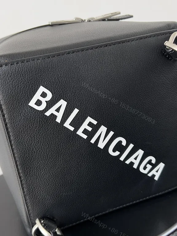 View 5 of Balenciaga Mini Bag: Black Textured Leather, Logo-Centric Chic