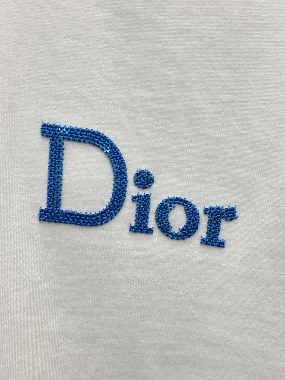 View 9 of Minimalist White Tee with Blue Embroidered Logo, Premium Cotton