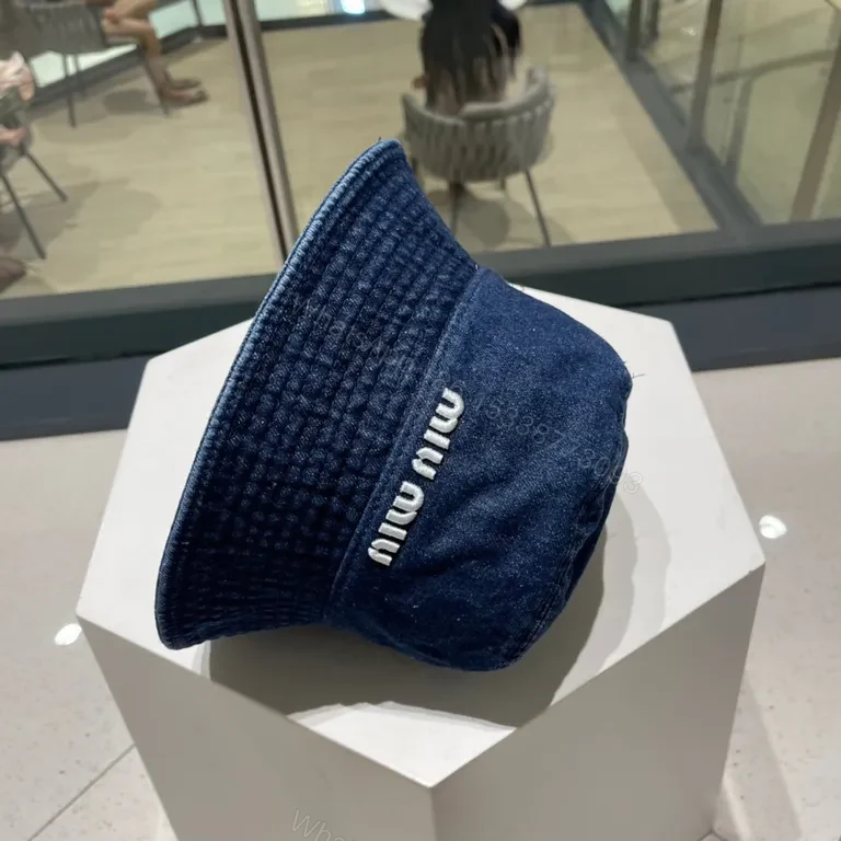 View 9 of Denim Bucket Hat: premium Miu Miu logo, casual luxe
