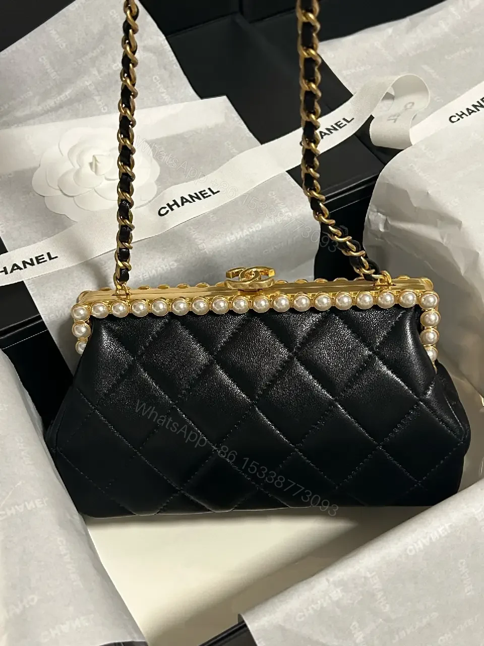 View 7 of Black Quilted Leather Clutch with Pearl Trim, Gold Frame, Elegant