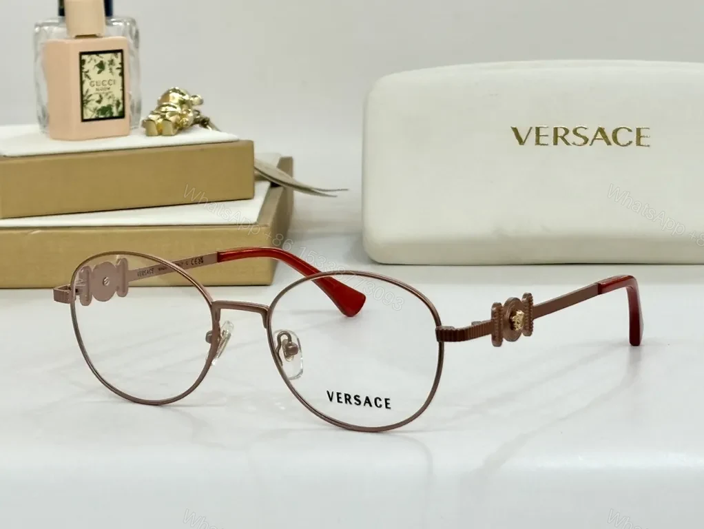 View 9 of Refined Round Eyewear: Luxury Metal Frames with Signature Detail