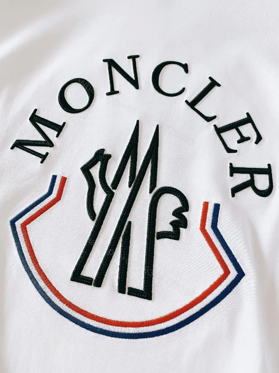 View 3 of White Cotton Crewneck Tee – Graphic Crest, Modern Luxe, Everyday Essential