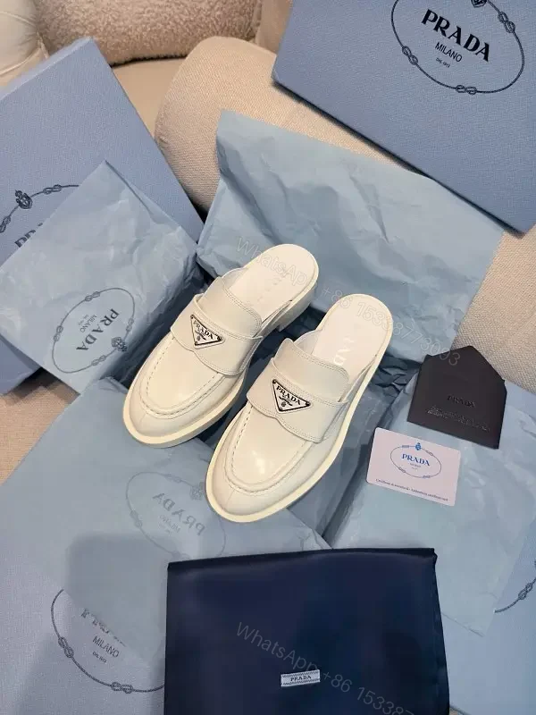 White Leather Prada Slip-ons: Classic Padded Comfort Shoes — view 1