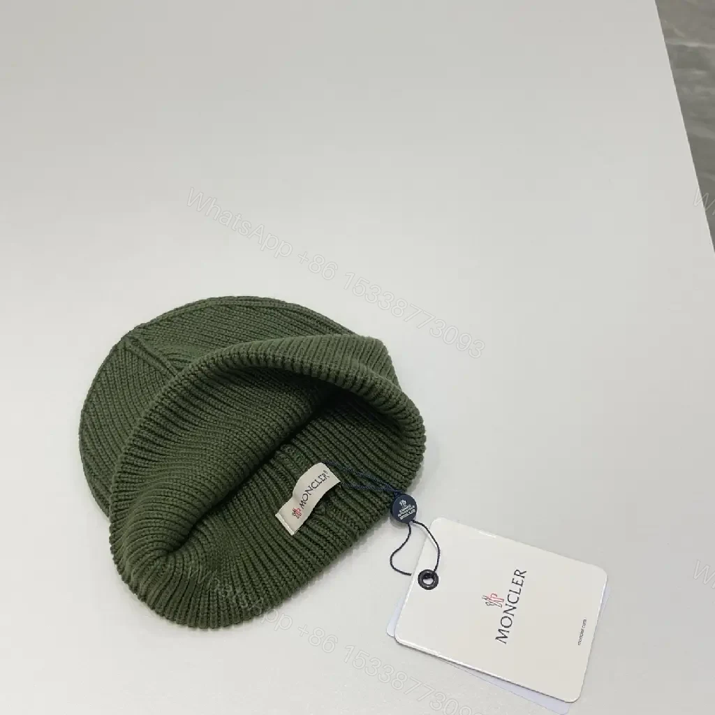 View 4 of Textured Knit Beanie - Luxe Wool, Ribbed Style, Subtle Logo, All-Season Warmth