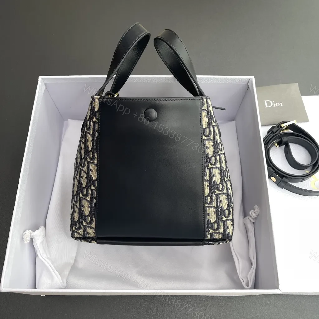 View 7 of Black Leather Mini Crossbody: Signature Monogram Compact Bag