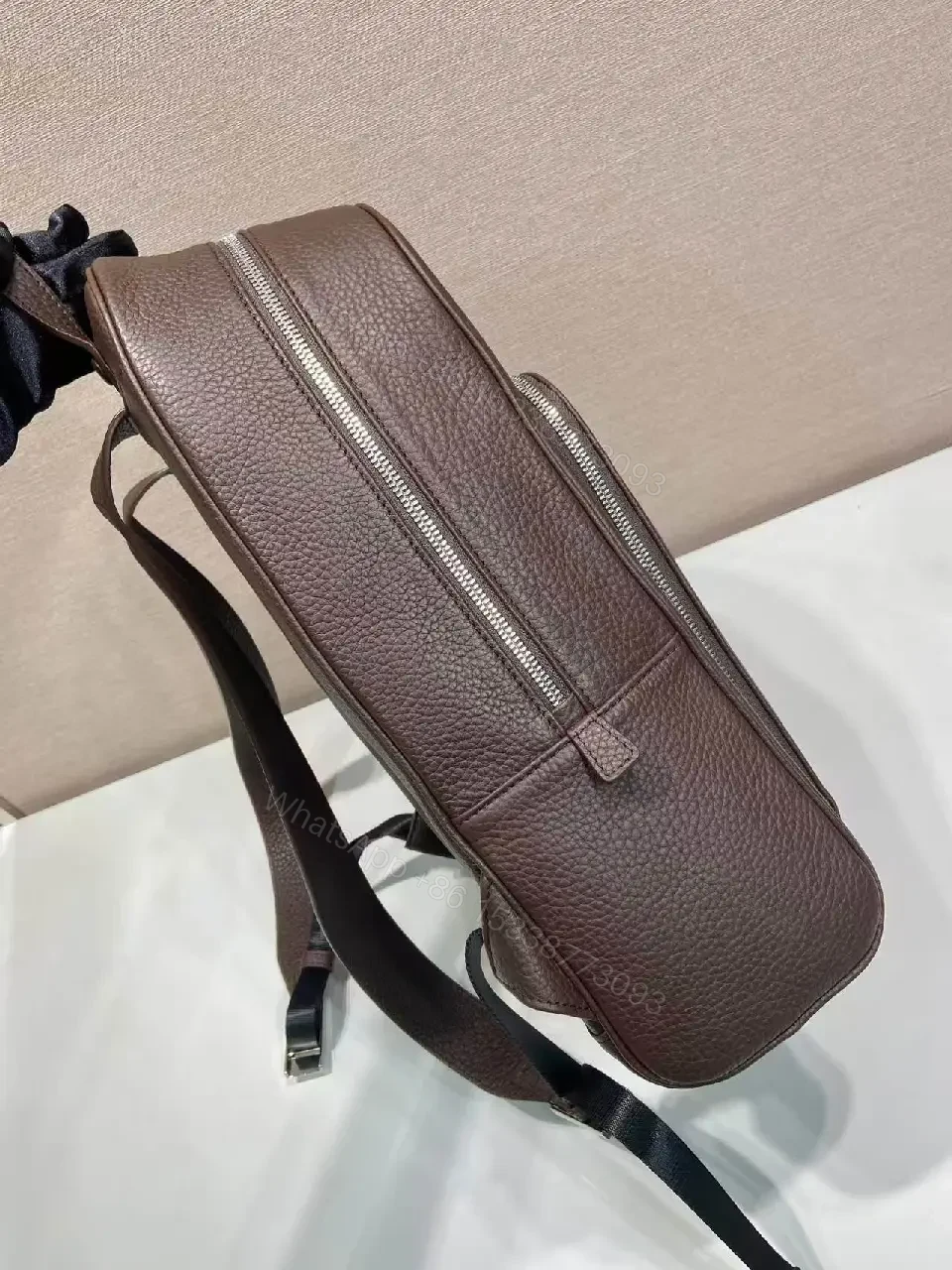 View 2 of Structured Luxury Leather Backpack: Modern Texture, Practical Detailing