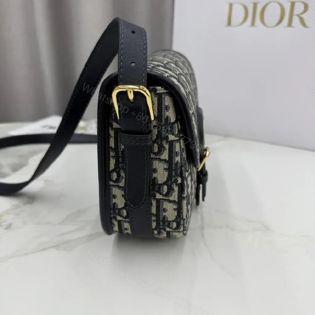 View 5 of Monochrome Canvas Crossbody: Luxe Pattern, Gold Hardware