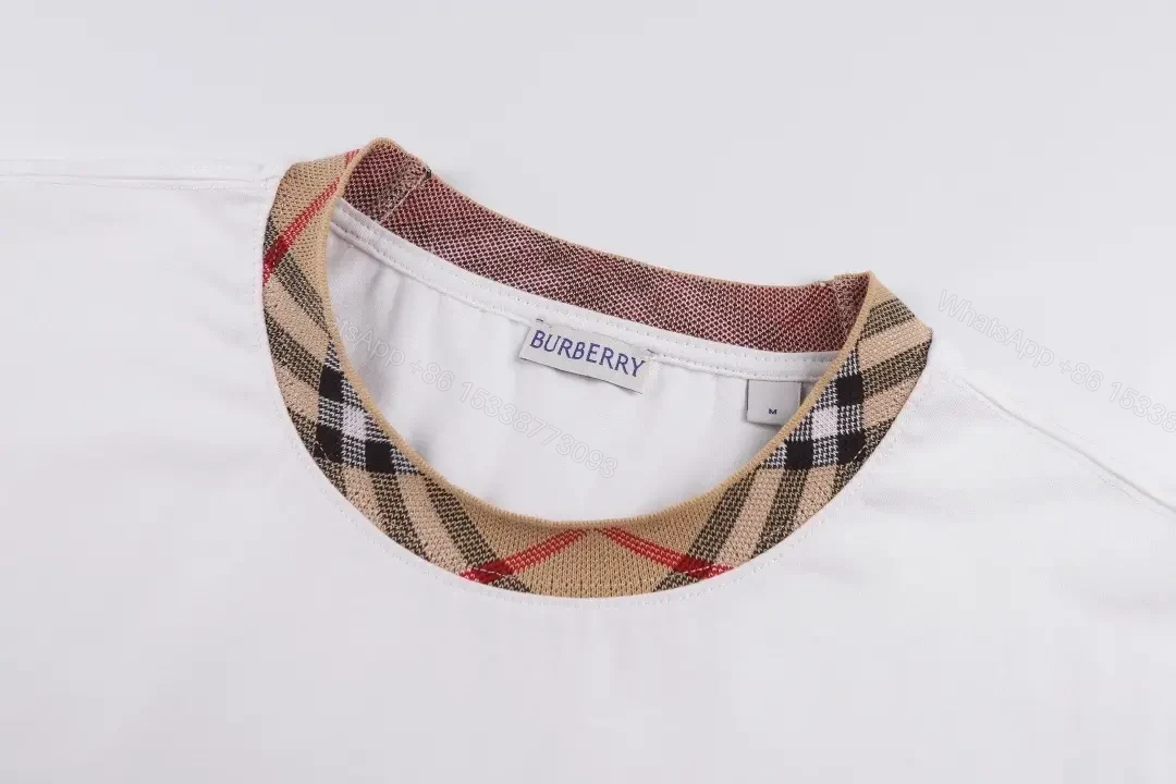 View 9 of Minimalist White Tee with Subtle Burberry Collar Detail
