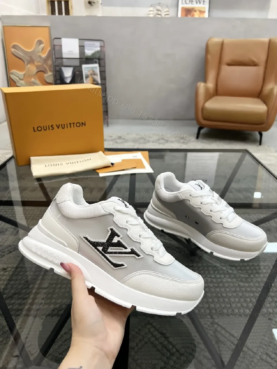 View 7 of White Leather Minimalist Luxe Sneakers with LV Detail