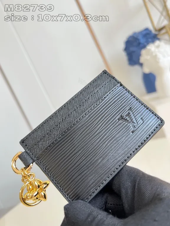 View 8 of Compact Black Textured Wallet with LV-Style Logo Details