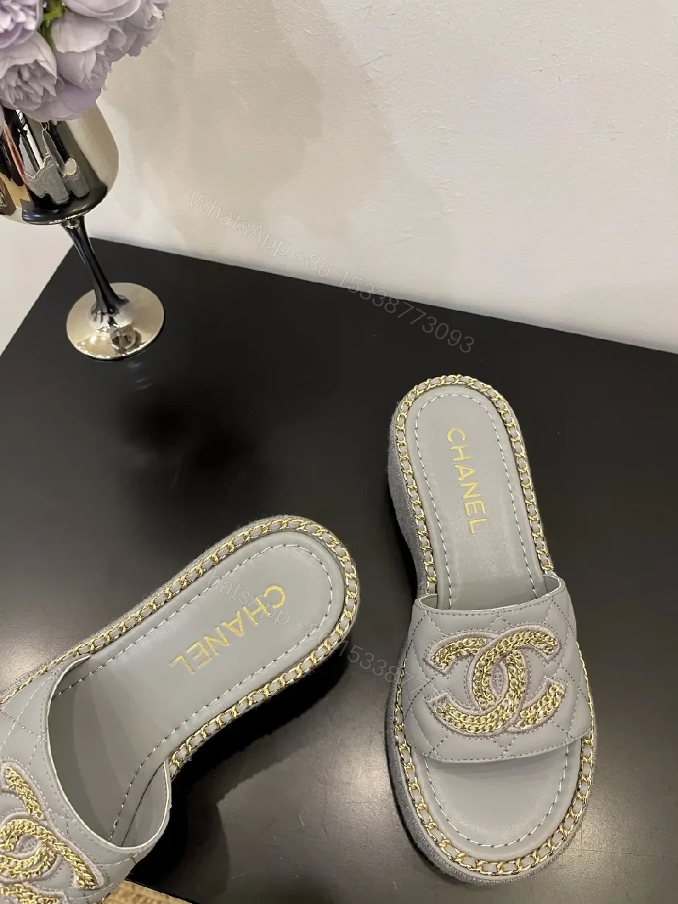 View 2 of Grey Leather Slip-On Sandals with Gold Chain Logo