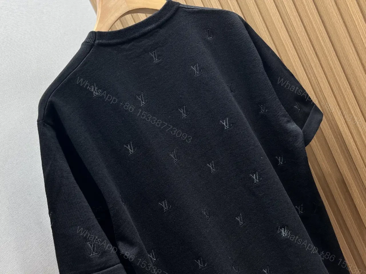 View 9 of Black Monogram Knit Tee: Subtle Texture, Everyday Luxury