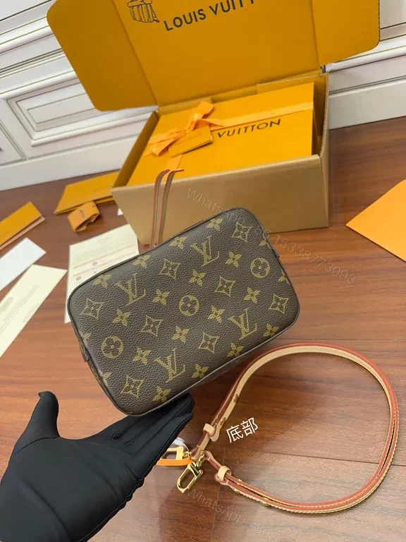 View 4 of Elegant Monogram Barrel Bag â€” LV Canvas, Leather Trim, Adjustable Strap, Day-to-Night Luxury