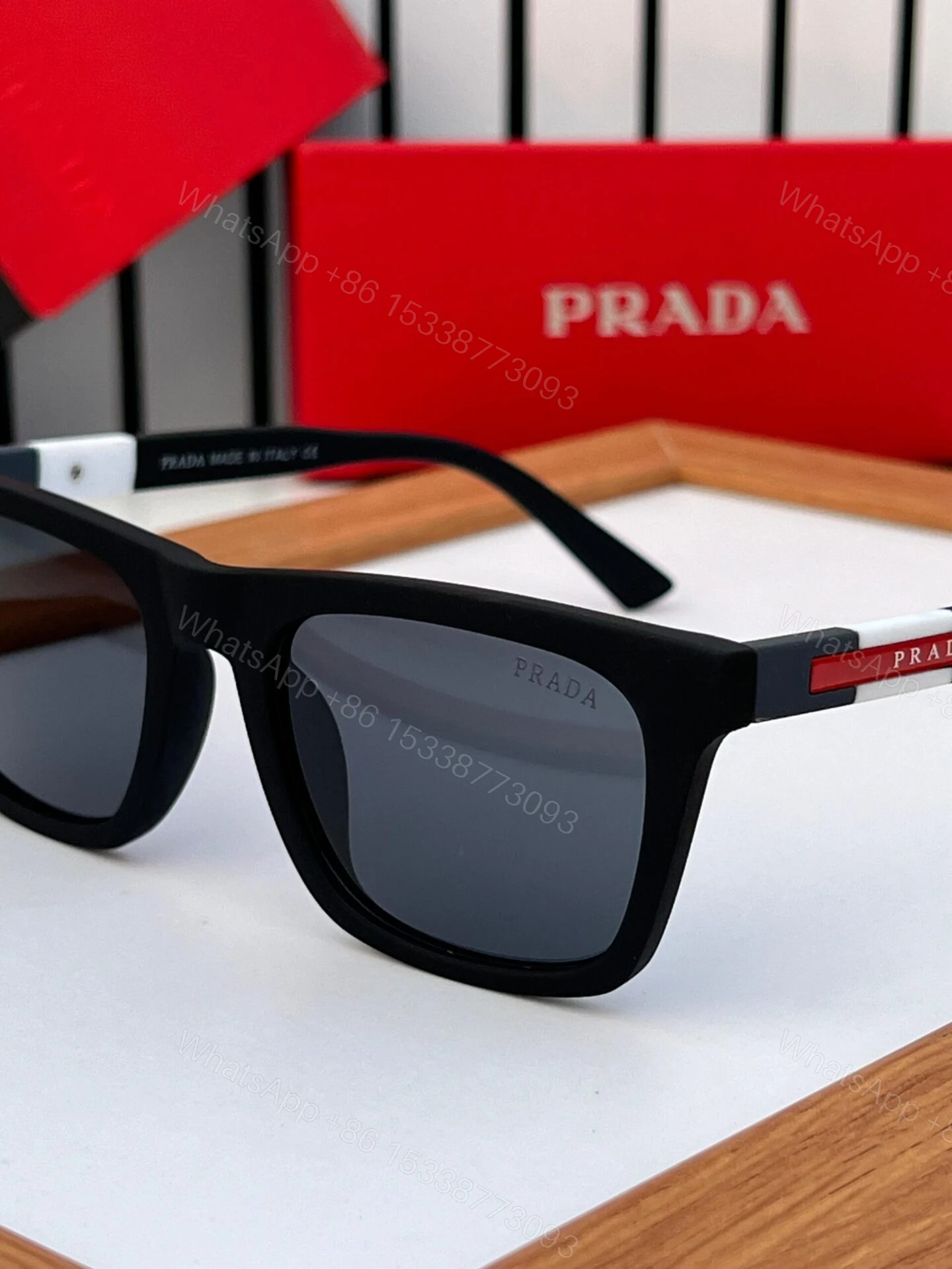 View 2 of Prada Sunglasses Black Grey