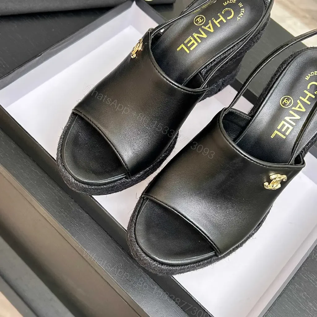 View 6 of Chic Black Leather Wedge Sandals - Gold Emblem, Open Toe, Slingback