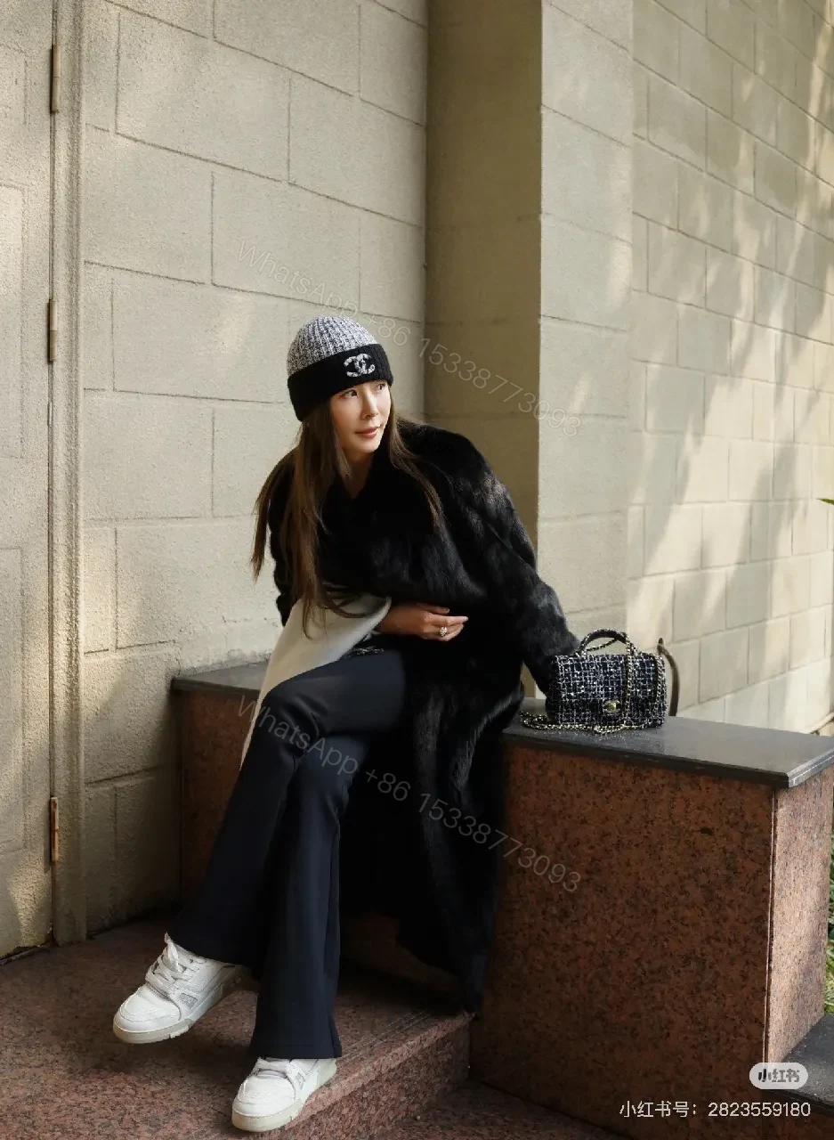 View 8 of Bold Knit Beanie with Logo Hardware - Luxury Casual Style