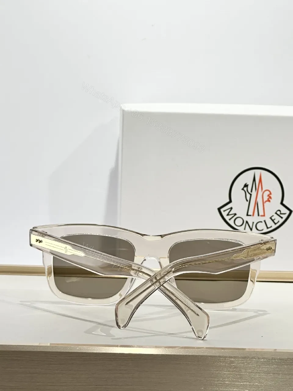 View 2 of Translucent Frame Sunglasses with Amber Lenses and Gold Accents