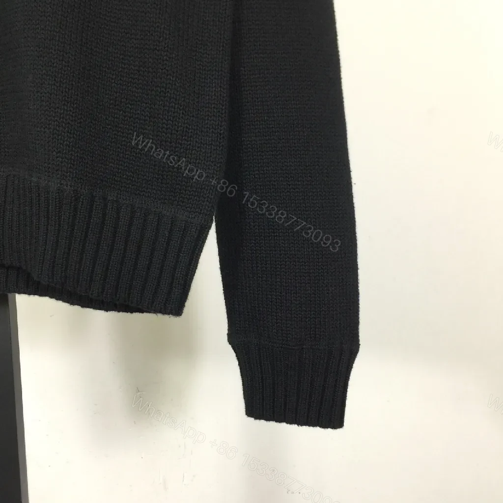 View 9 of Leather-Feel Knit Crewneck with Crest: Subtle Luxury Comfort