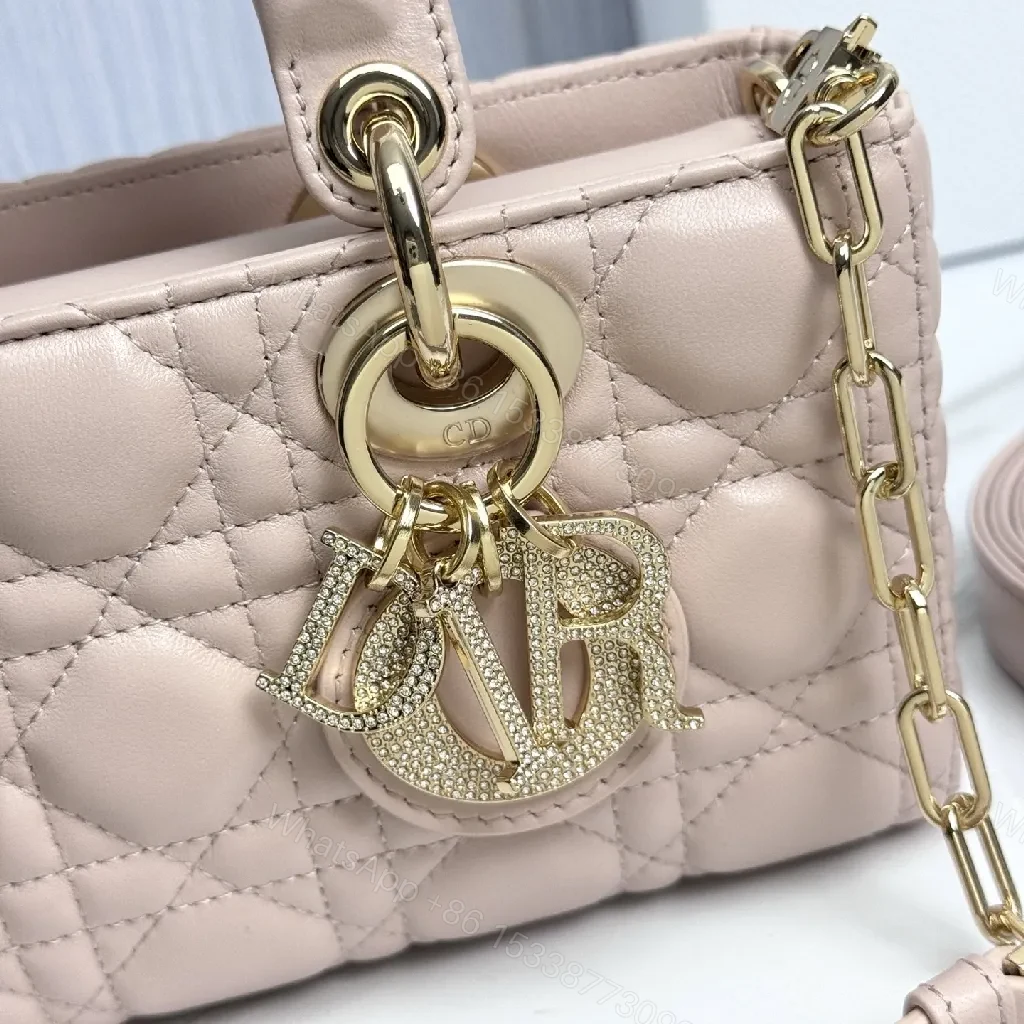 View 2 of Soft Pink Quilted Dome Bag: Mini Luxury Crossbody