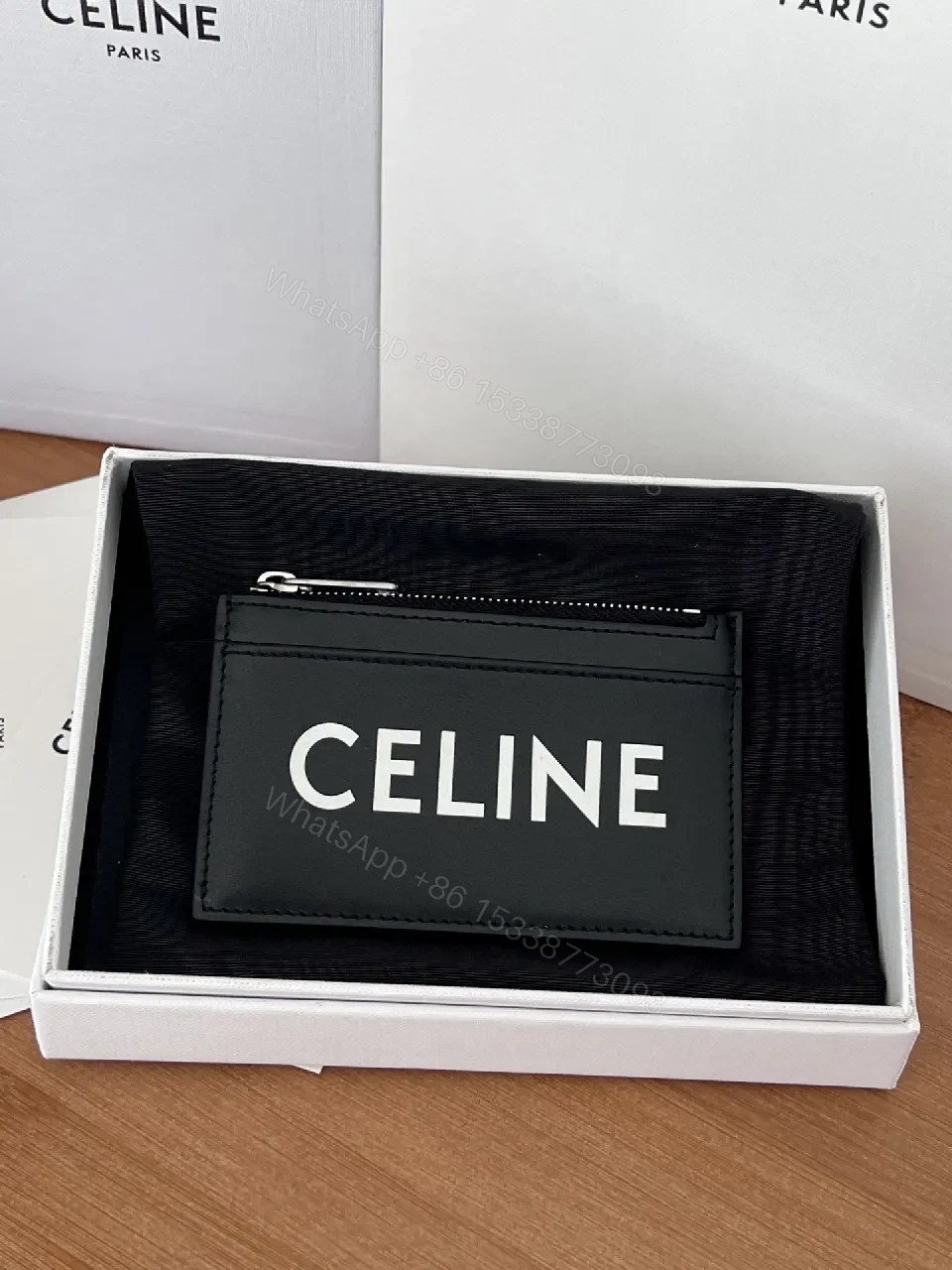 Minimalist Black Cardholder: Bold CELINE Print, Compact Luxury — view 1
