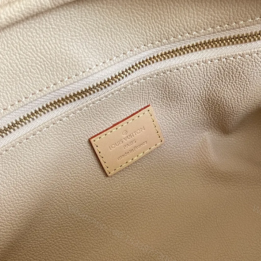 View 3 of Brown Leather-Toned LV Monogram Cosmetic Pouch with Gold Zipper