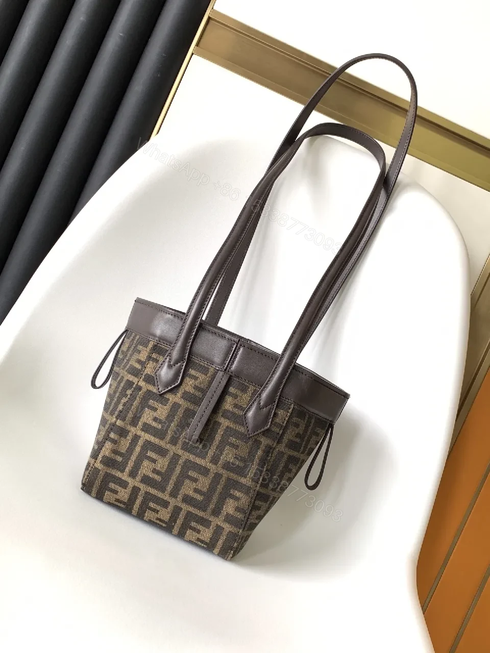 View 2 of Monogram Canvas Mini Tote: Structured Everyday Luxury