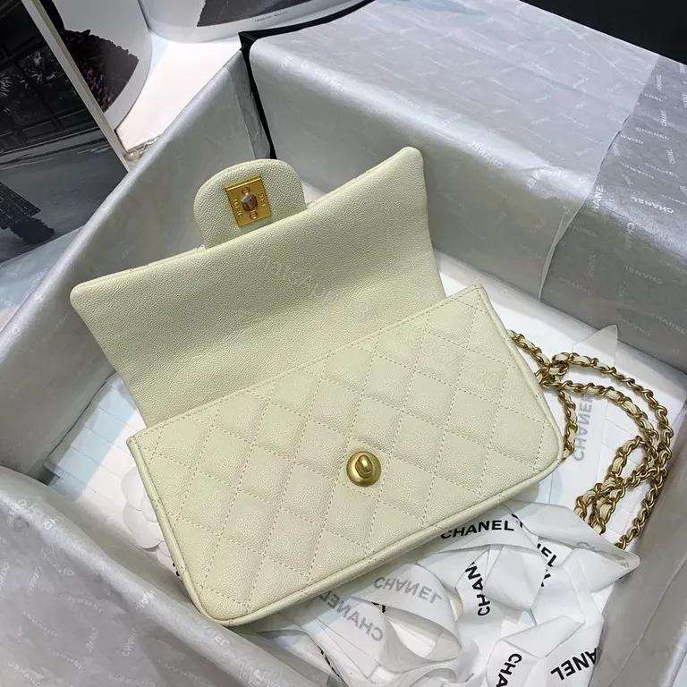View 4 of Compact Quilted Handbag with Gold Chain Strap - Timeless Luxury