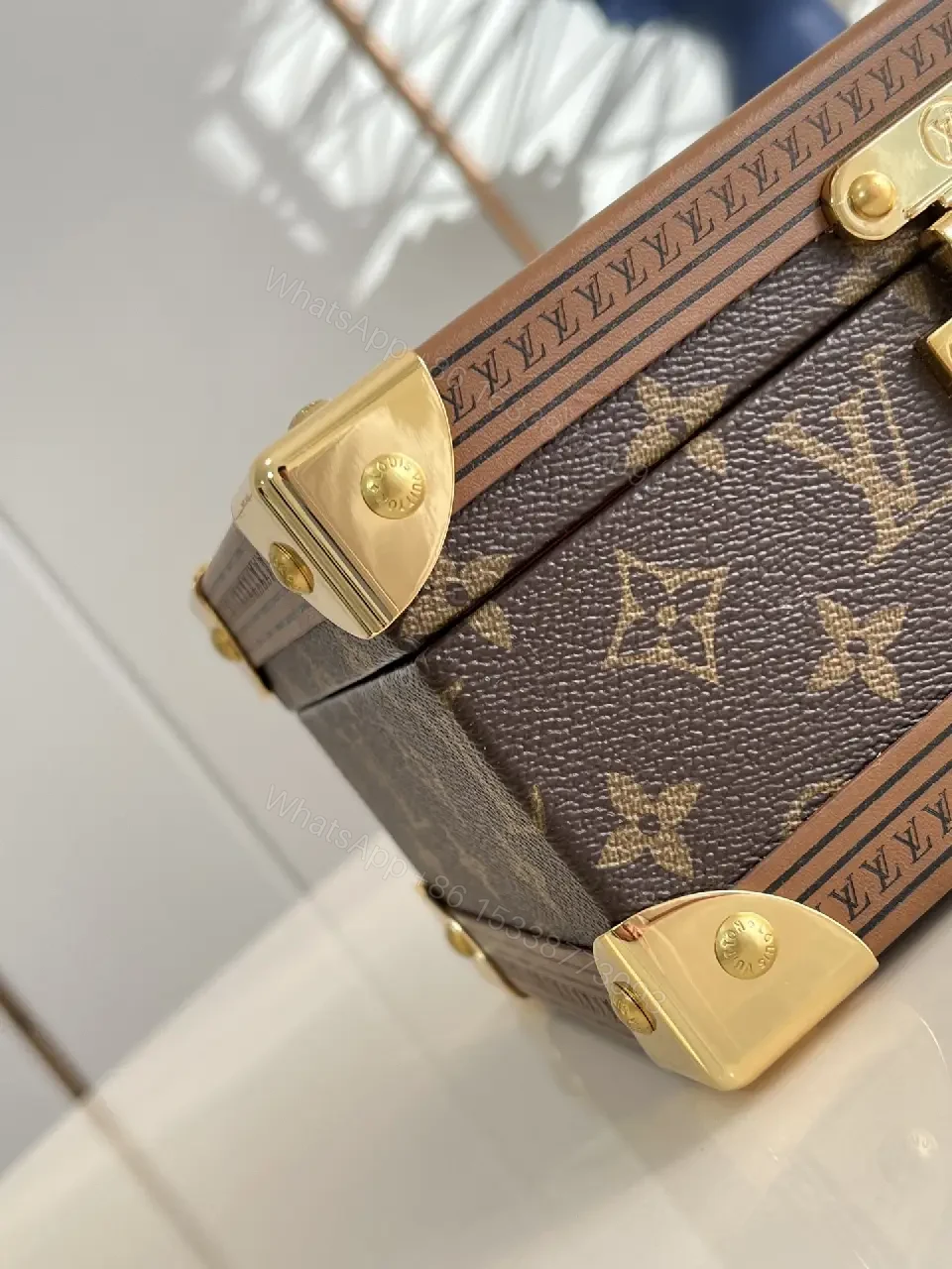 View 6 of Monogram Canvas Clutch with Gold Hardware - Structured Luxe Style