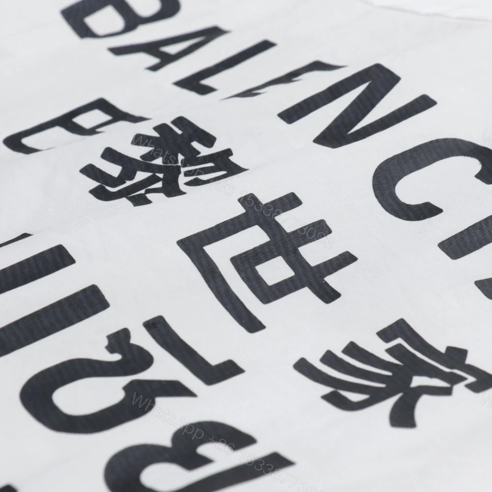 View 7 of 高仿Balenciaga*SS24系列647357七國語言襯衫白色