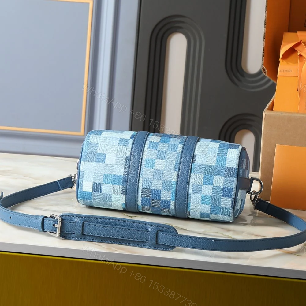 View 5 of Louis Vuitton Keepall Bandoulière 25 Blue 25Cm M28600