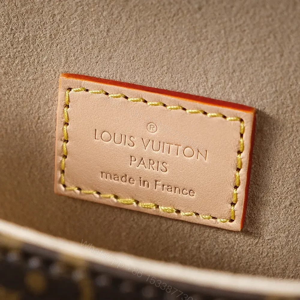 View 14 of Louis Vuitton Saumur BB in Monogram