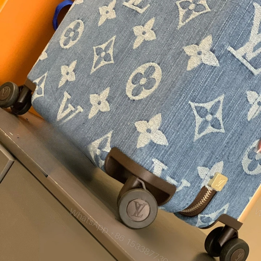 View 5 of Louis Vuitton Horizon 55 Suitcase Monogram Cotton Canvas Denim Blue 55Cm M24314