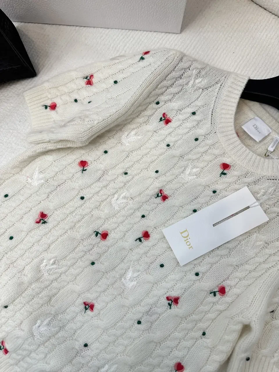 View 5 of White Cable-Knit Floral Knitwear: Subtle Luxury, Everyday Comfort