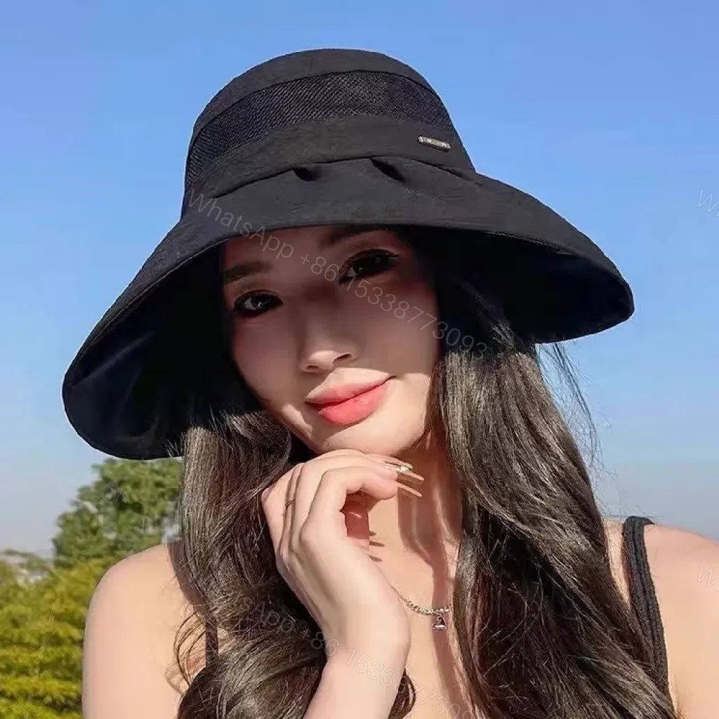 View 7 of Minimalist Black Bucket Hat with Discreet Luxe Label