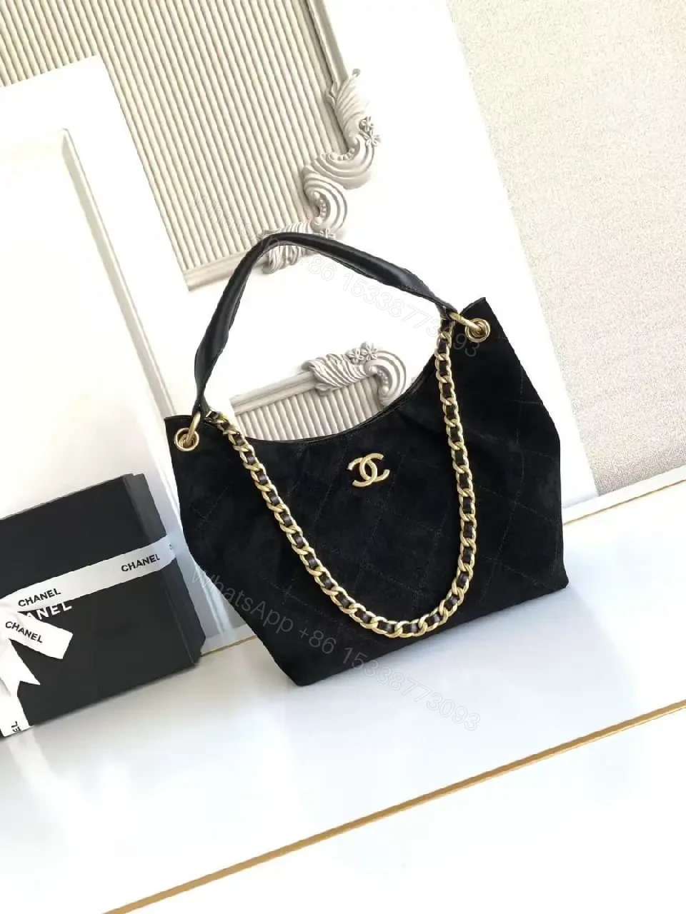 View 6 of Chic Black Quilted Bag with Gold Chain: Everyday Luxury