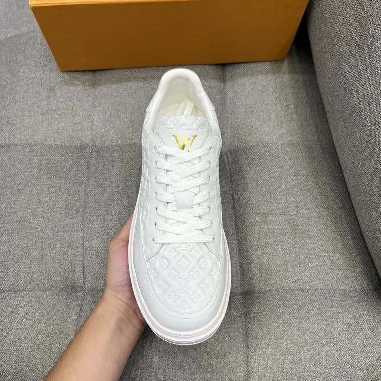 White Leather Sneakers with Gold LV Accent, Luxe Everyday — view 1