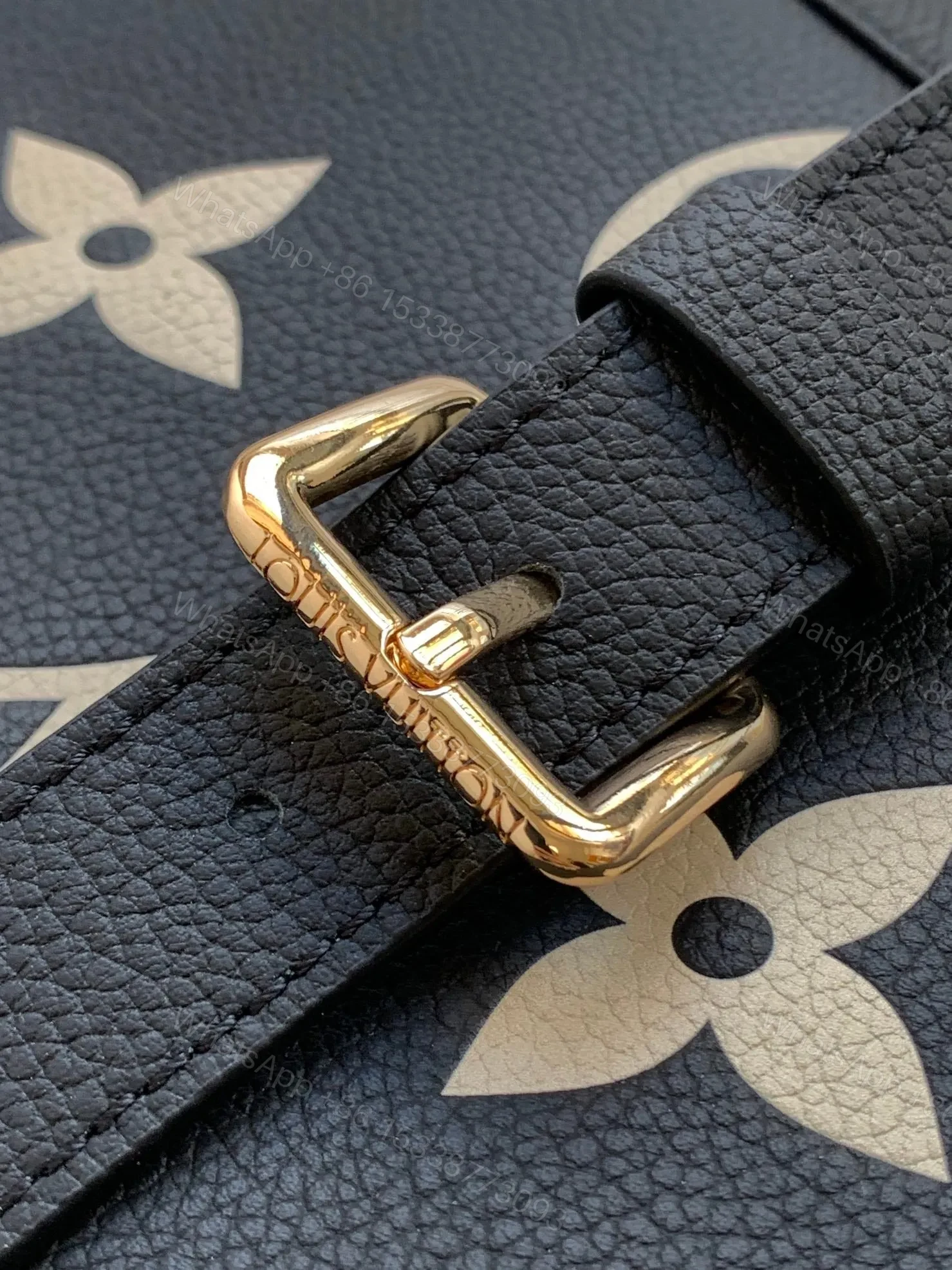 View 4 of LV MADELEINE 30 IN BLACK MIX WHITE MONOGRAM CALFSKIN EMBOSSED LOGO