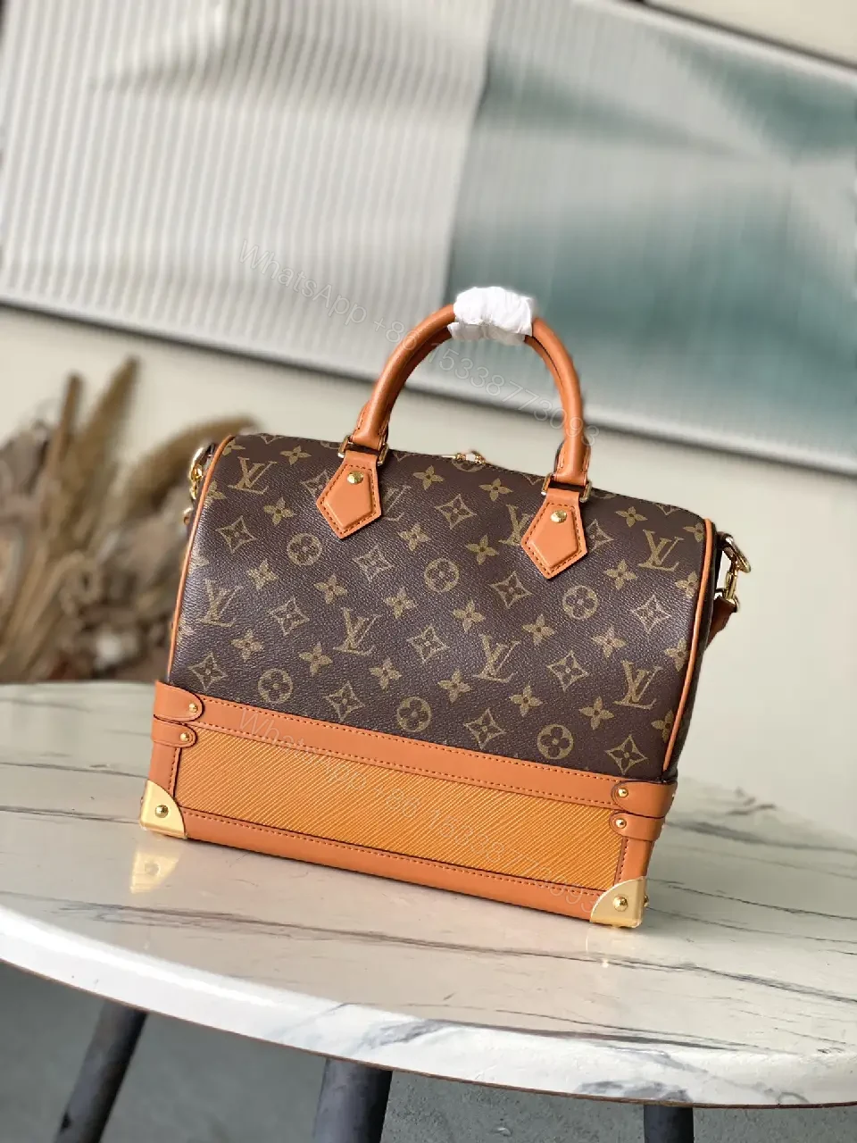 View 5 of Brown Monogram Canvas Satchel with Tan Leather Trim, Structured Style, Gold Hardware, Top Handles
