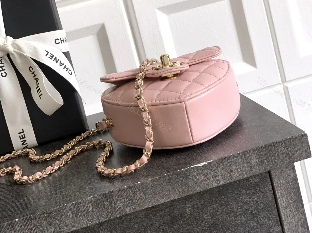 View 8 of Soft Pink Quilted Heart Mini Bag with Gold Logo Bag