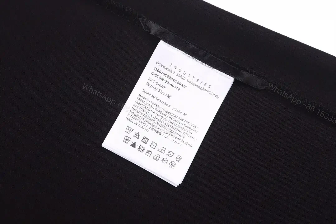 View 10 of Matte Black Cotton Tee with Subtle Embossed Logo, Modern Comfort