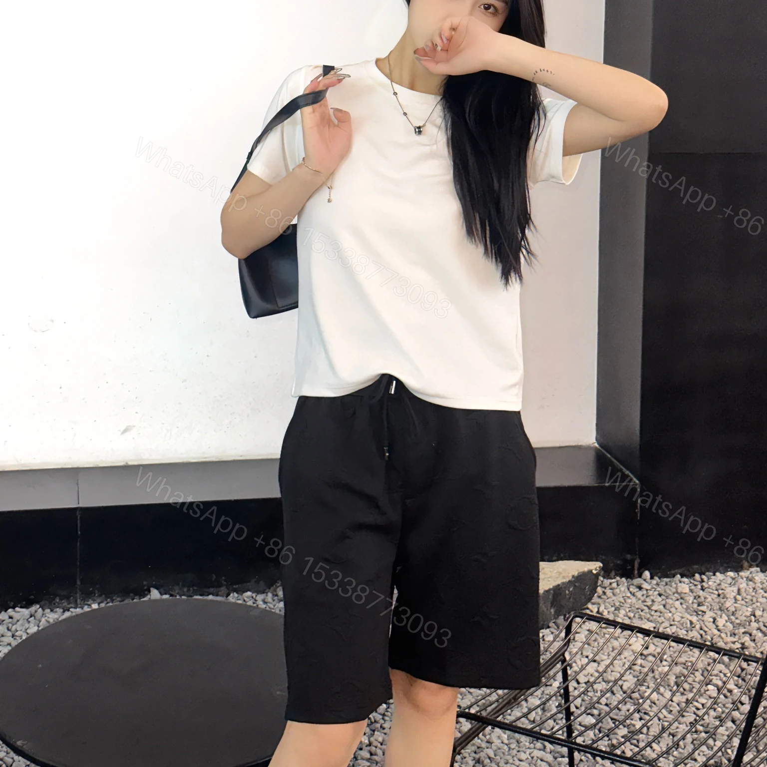 View 20 of 高仿LV*1AFR0053滿印提花休閒短褲黑色
