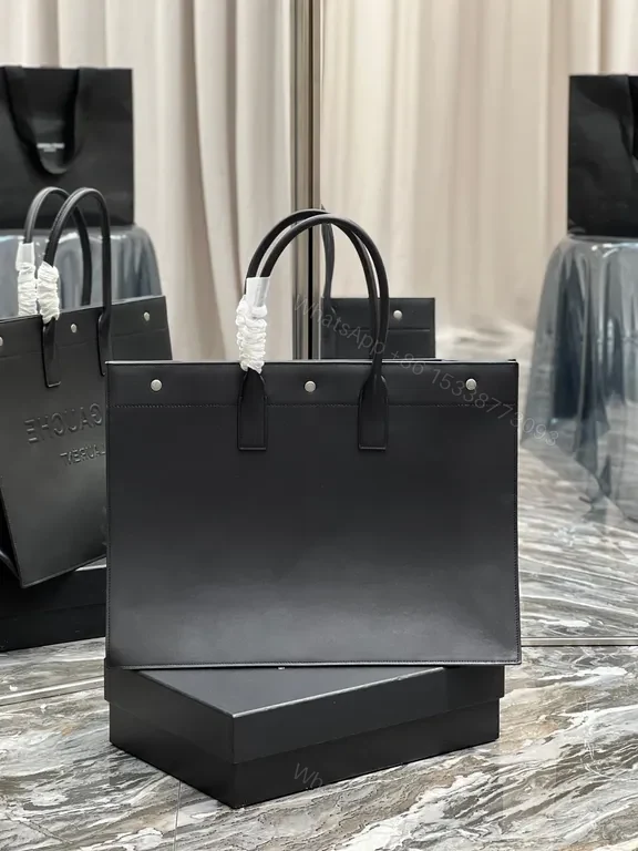 View 3 of Structured Minimalism: Leather Tote with Embossed Branding (60)